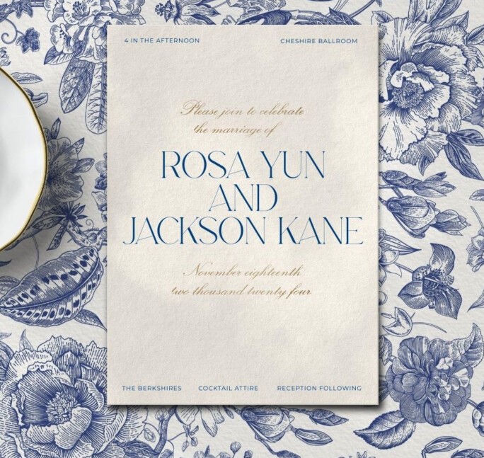 blue floral wedding invitation suite with elegant serif typography and chinoiserie-inspired pattern background