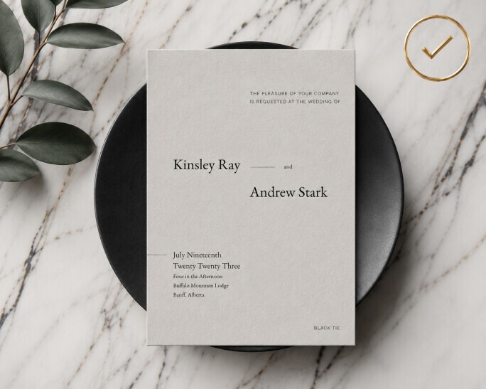 Minimalist black tie wedding invitation flat lay on marble with elegant serif typography and a refined gold checkmark icon in the upper corner, styled with modern luxury stationery details and soft editorial lighting for a wedding planning checklist thumbnail.
